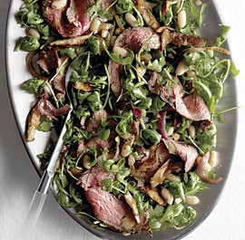 Grilled steak and arugula salad with white beans and shiitake