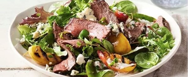 Grilled steak and peach salad