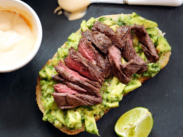 Grilled steak, avocado, and spicy crema sandwiches