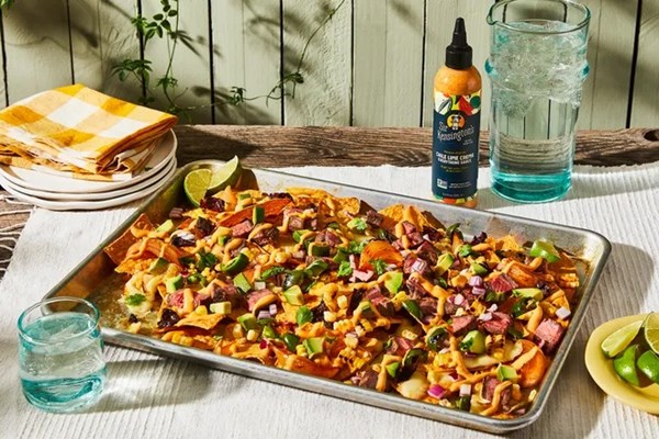 Grilled steak nachos with chile lime crema 