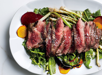 Grilled steak salad with beets and scallions