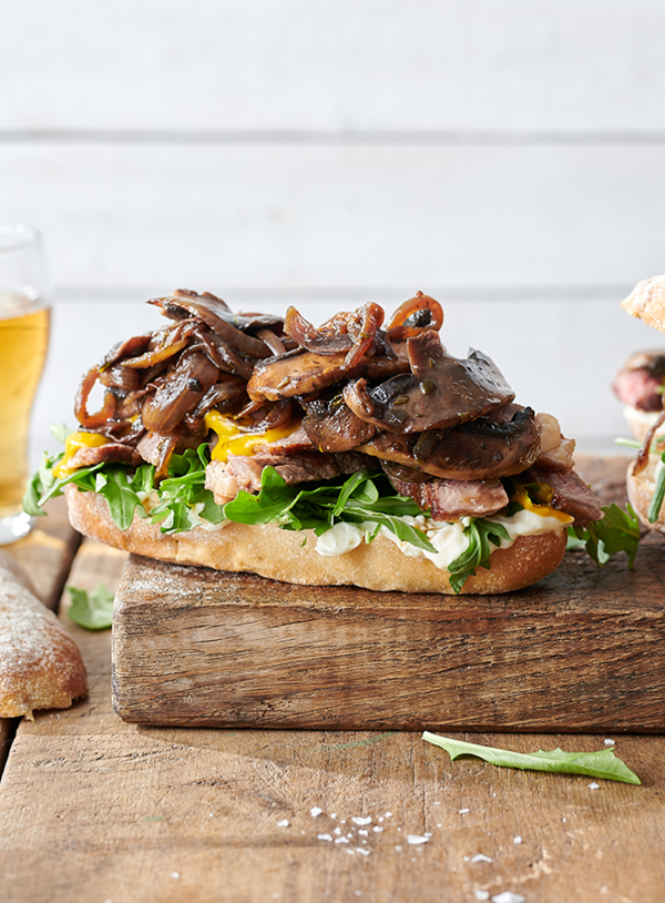 Grilled steak sandwich with caramelised onions and mushrooms