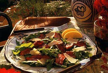 Grilled steak with arugula and shaved Parmesan (Bistecca ai ferri con rucola e Parmigiano)