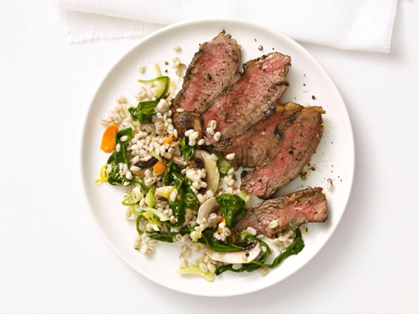 Grilled steak with barley salad