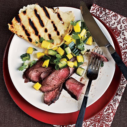 Grilled steak with fresh mango salsa