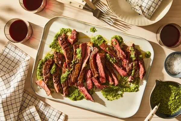 Grilled steak with garlicky green sauce