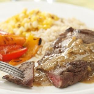 Grilled steak with whiskey Dijon BBQ sauce