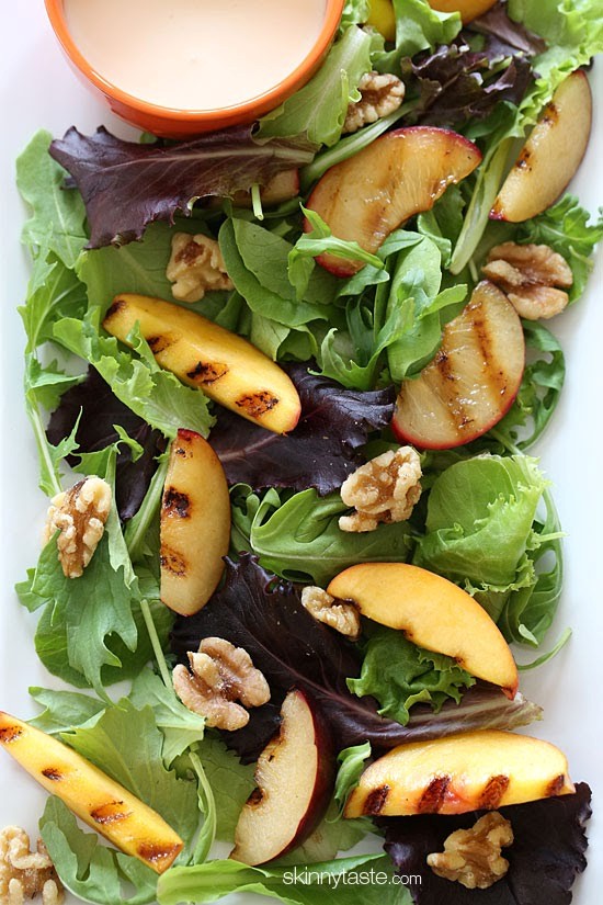Grilled stone fruit salad with honey goat cheese dressing