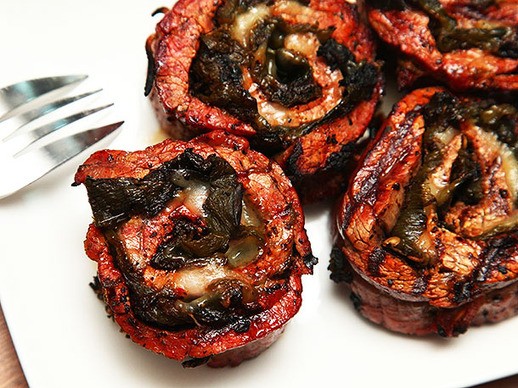 Grilled stuffed flank steak with roasted chilies and pepper Jack cheese