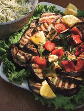 Grilled summer vegetables with harissa dressing