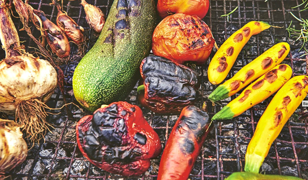 Grilled summer vegetables with root green chimichurri