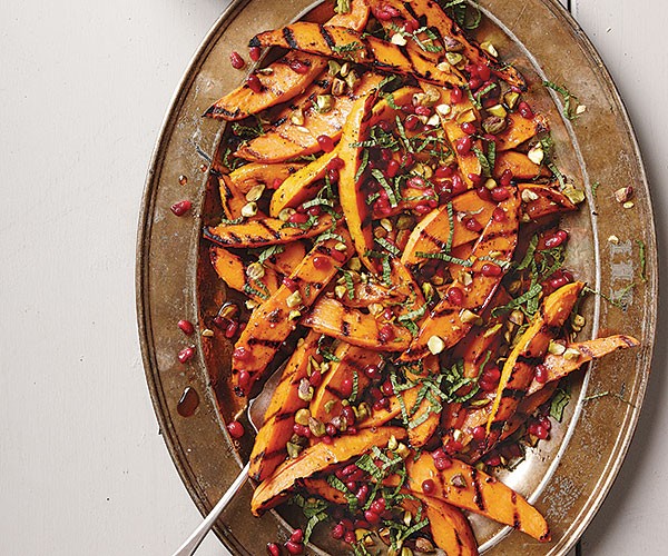 Grilled sweet potato, pistachio, and pomegranate salad