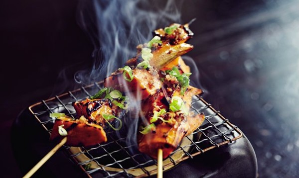 Grilled sweet potatoes with soy sauce, maple, and bacon