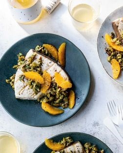 Grilled swordfish with green olives and oranges