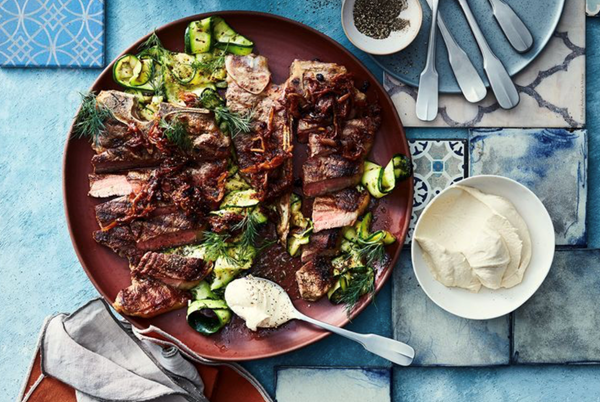 Grilled T-bone with garlicky dill zucchini and caramelised onions