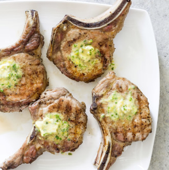 Grilled thick-cut bone-in pork chops