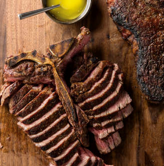 Grilled thick-cut porterhouse steaks