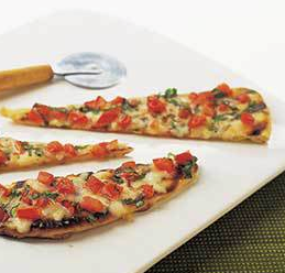 Grilled tomato-and-cheese pizzas