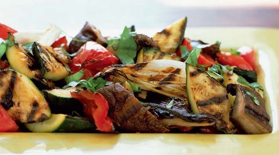 Grilled tomatoes with basil butter