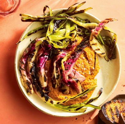 Grilled torpedo onions with romesco sauce