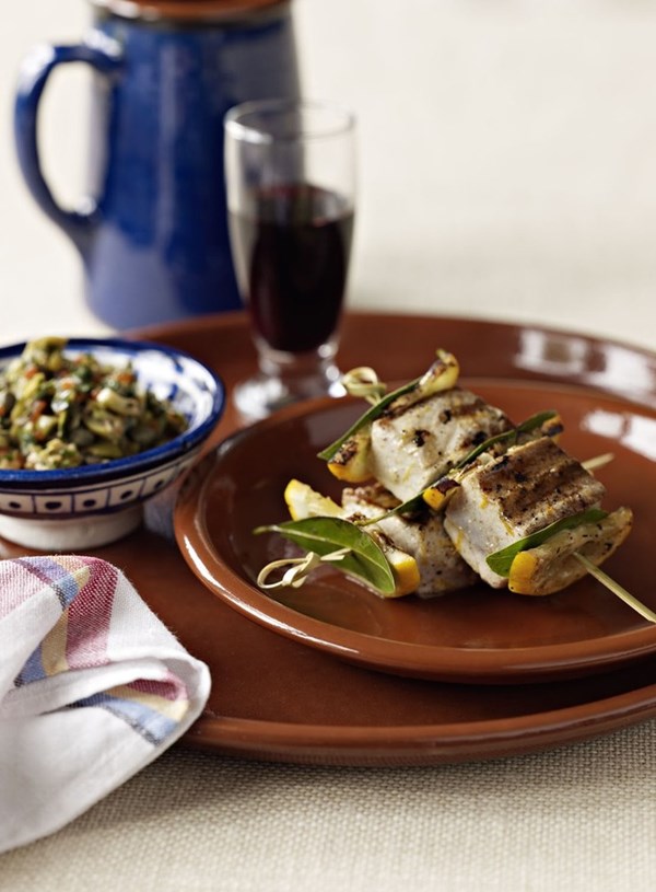 Grilled tuna skewers with green olive relish