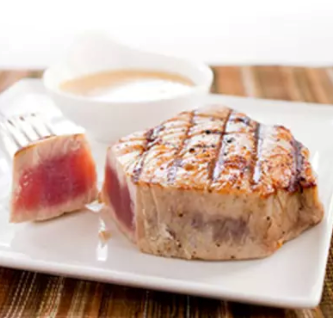 Grilled tuna steaks with chermoula vinaigrette