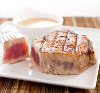 Grilled tuna steaks with chermoula vinaigrette