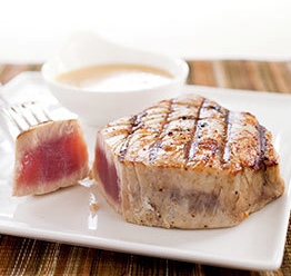 Grilled tuna steaks with red wine vinegar and mustard vinaigrette