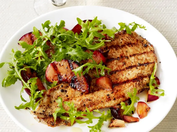 Grilled turkey with plum salad
