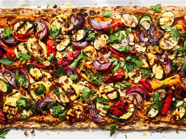 Grilled vegetable flatbread with smoked almond muhammara