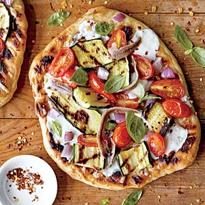 Grilled vegetable pizzas with anchovies