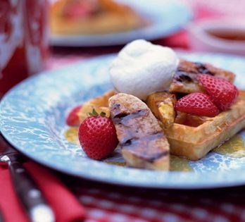Grilled waffles with grilled fruit and maple whipped cream