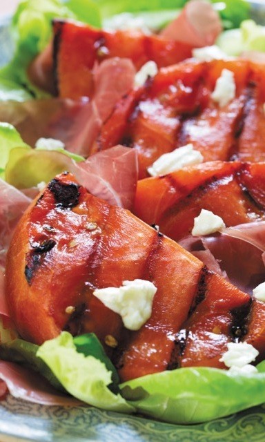 Grilled watermelon with goat cheese and prosciutto