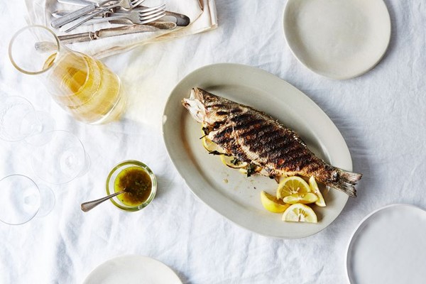 Grilled whole branzino with "Greek fish sauce"