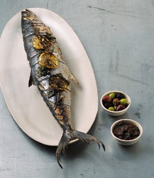 Grilled whole mackerel with lemon, oregano, and olives