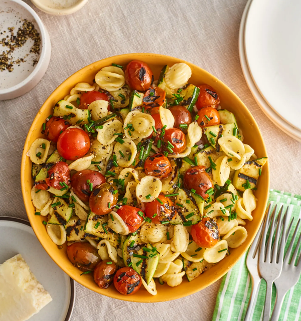 Grilled zucchini and tomato pasta salad