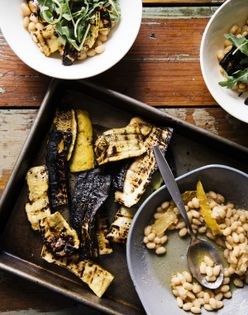 Grilled zucchini planks with white beans, olive oil, and rosemary