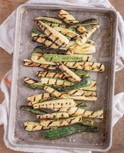 Grilled zucchini with nut salsa, mint & ricotta