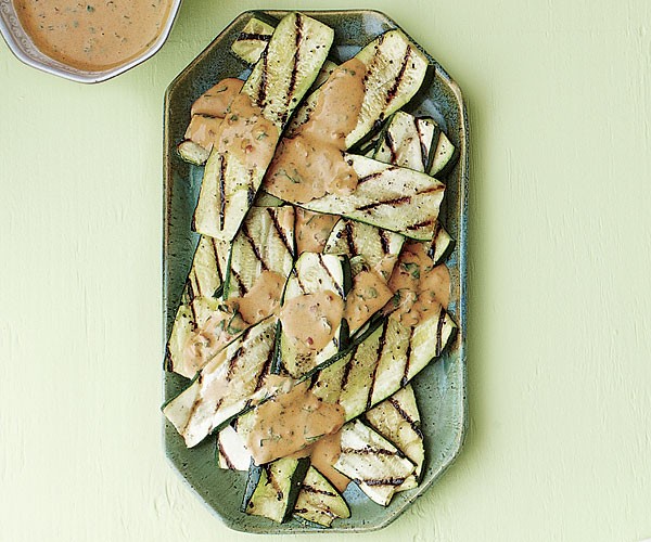 Grilled zucchini with spicy peanut sauce