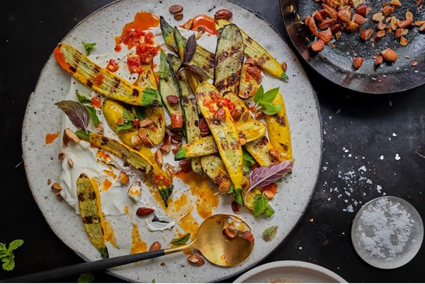Grilled zucchini with whipped ricotta, Calabrian chili, and almonds