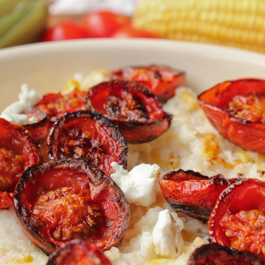 Grits with corn, goat cheese and roasted tomatoes