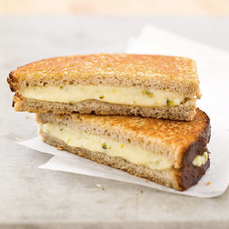 Grown-up grilled cheese sandwiches with Comté and cornichon