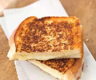 Grown-up grilled cheese sandwiches with cheddar and shallot