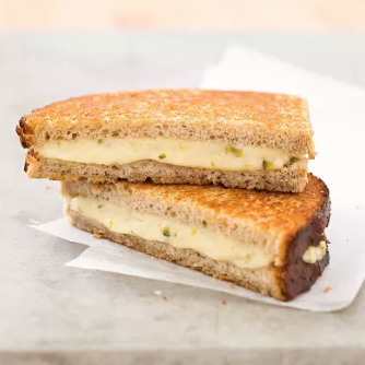 Grown-up grilled cheese sandwiches with Comté and cornichon