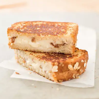 Grown-up grilled cheese sandwiches with Asiago and dates
