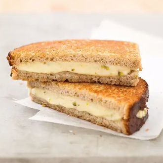 Grown-up grilled cheese sandwiches with Comté and cornichons