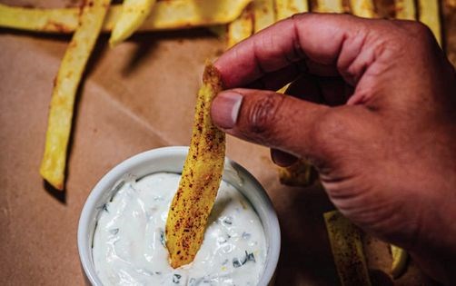 Gunpowder oven "fries" with goat cheese dip