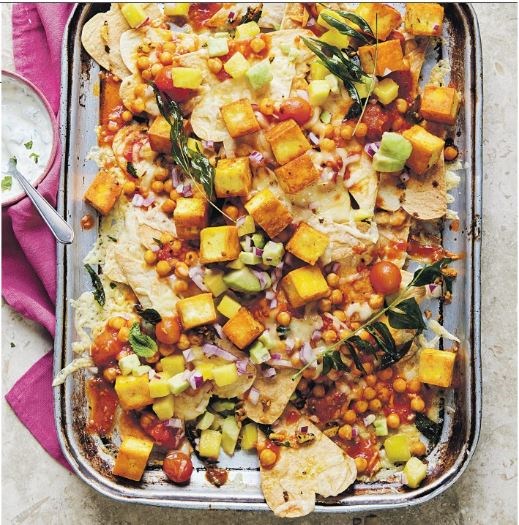 Gunpowder paneer nachos with mango avocado salsa & minted sour cream