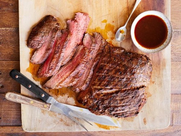 Guy Fieri's grilled tequila-garlic-lime flank steak