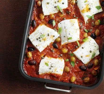 Haddock baked with tomato and olives